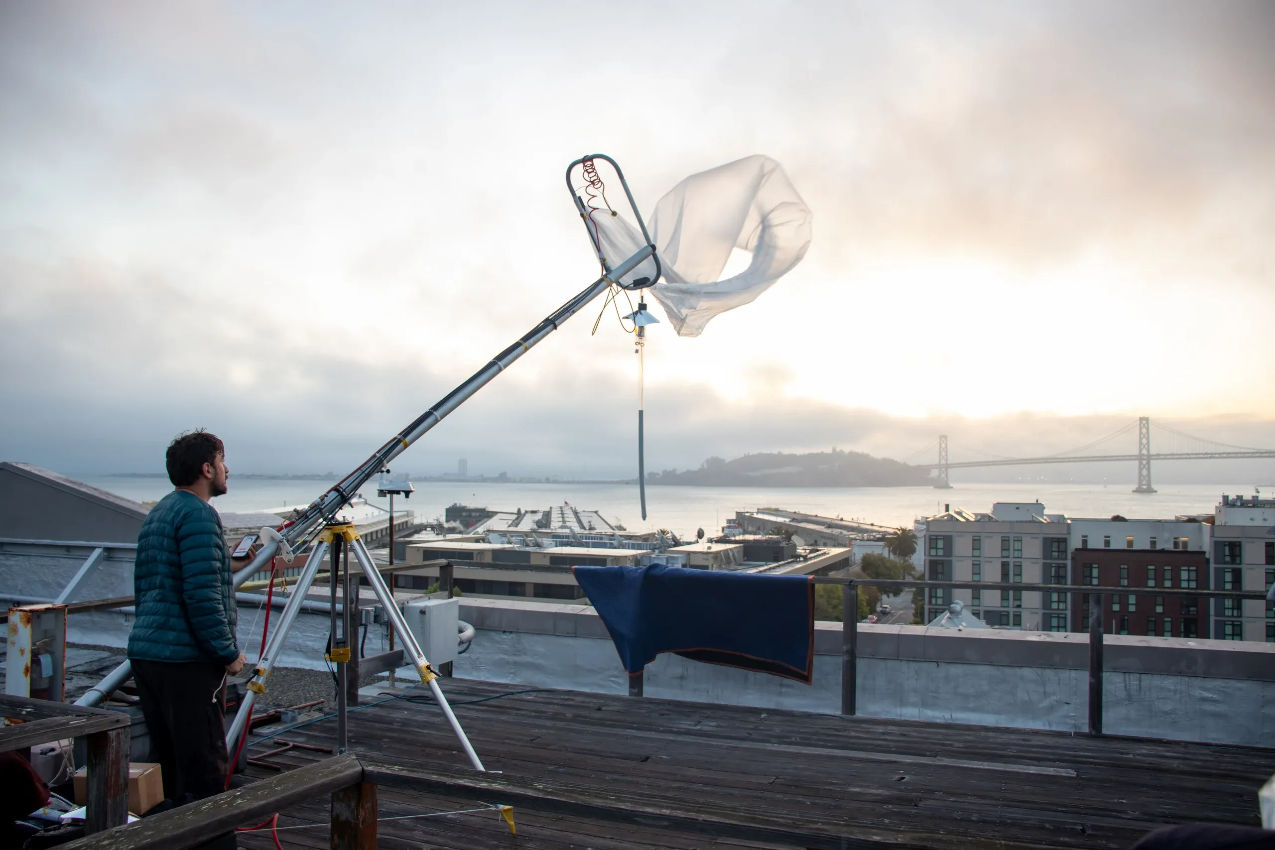 A WindBorne balloon suspended above San Francisco Bay before launch
